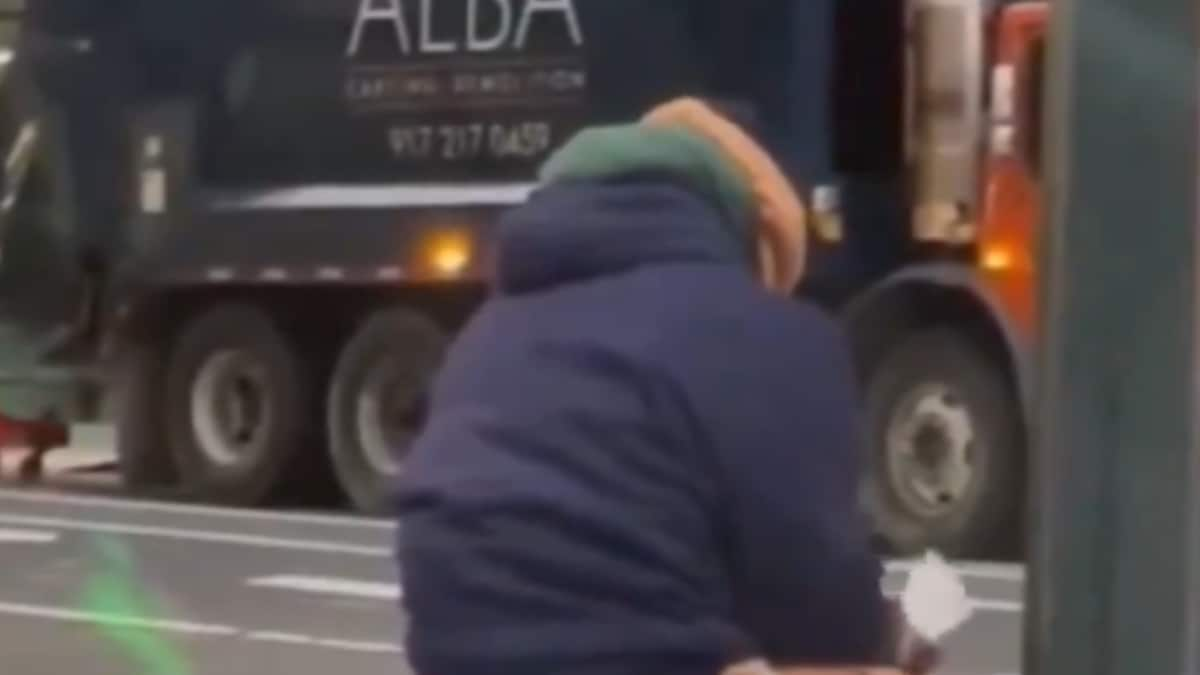 Shocking Video Shows Man Defecating In Trash Bin On Busy.png