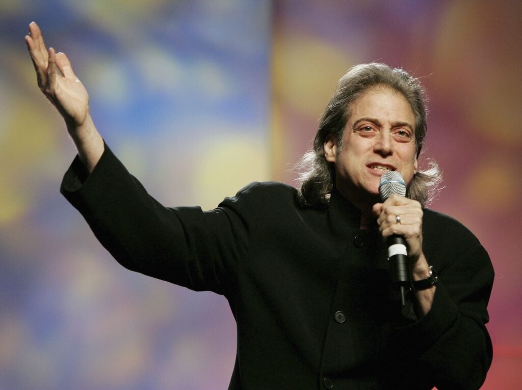 Richard Lewis on stage hosting an award show in 2015.