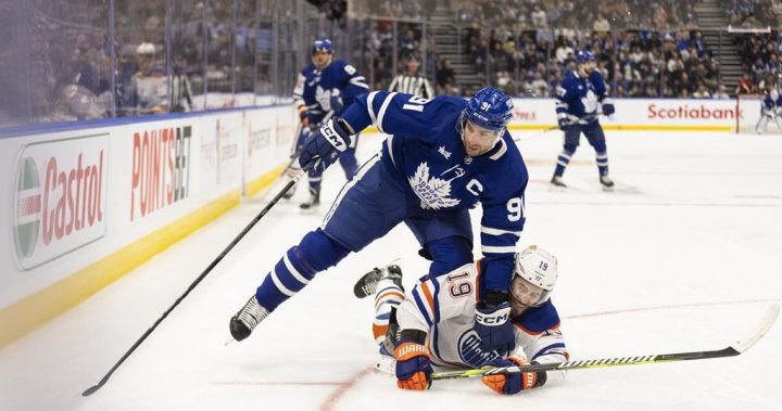 1711246344 Mcmann Holmberg Lead Leafs Over Oilers.jpg