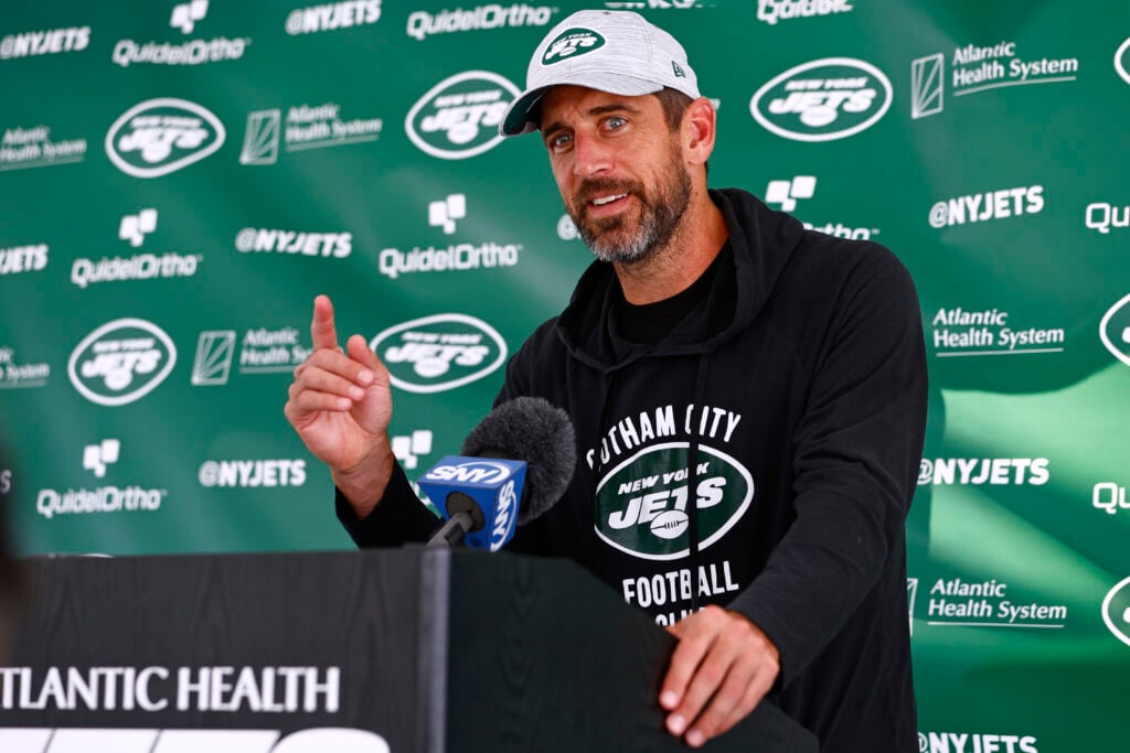 Quarterback Aaron Rodgers #8 of the New York Jets talks to reporters after training camp at Atlantic Health Jets Training Center on July 26, 2023 in Florham Park, New Jersey.