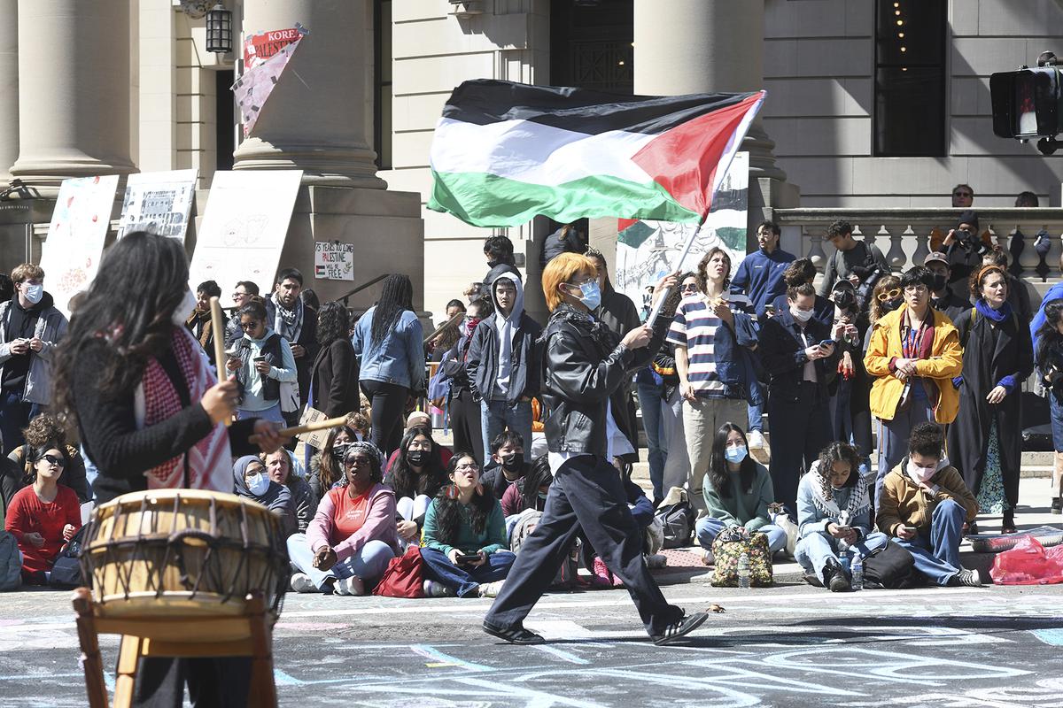 Several hundred students and pro-Palestinian supporters rally at the intersection of Grove and College Streets, in front of Woolsey Hall on the campus of Yale University in New Haven, Conn. on April 22, 2024. U.S. colleges and universities are preparing for end-of-year commencement ceremonies with a unique challenge: providing safety for graduates while honoring the free speech rights of students involved in protests over the Israel-Hamas war.